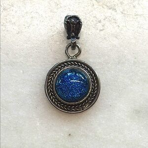 Sterling Silver NWOT Handcrafted Pendant with blue sparkling center